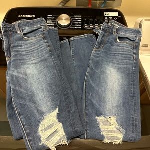 2 pairs of American eagle sz2 high rise jeans